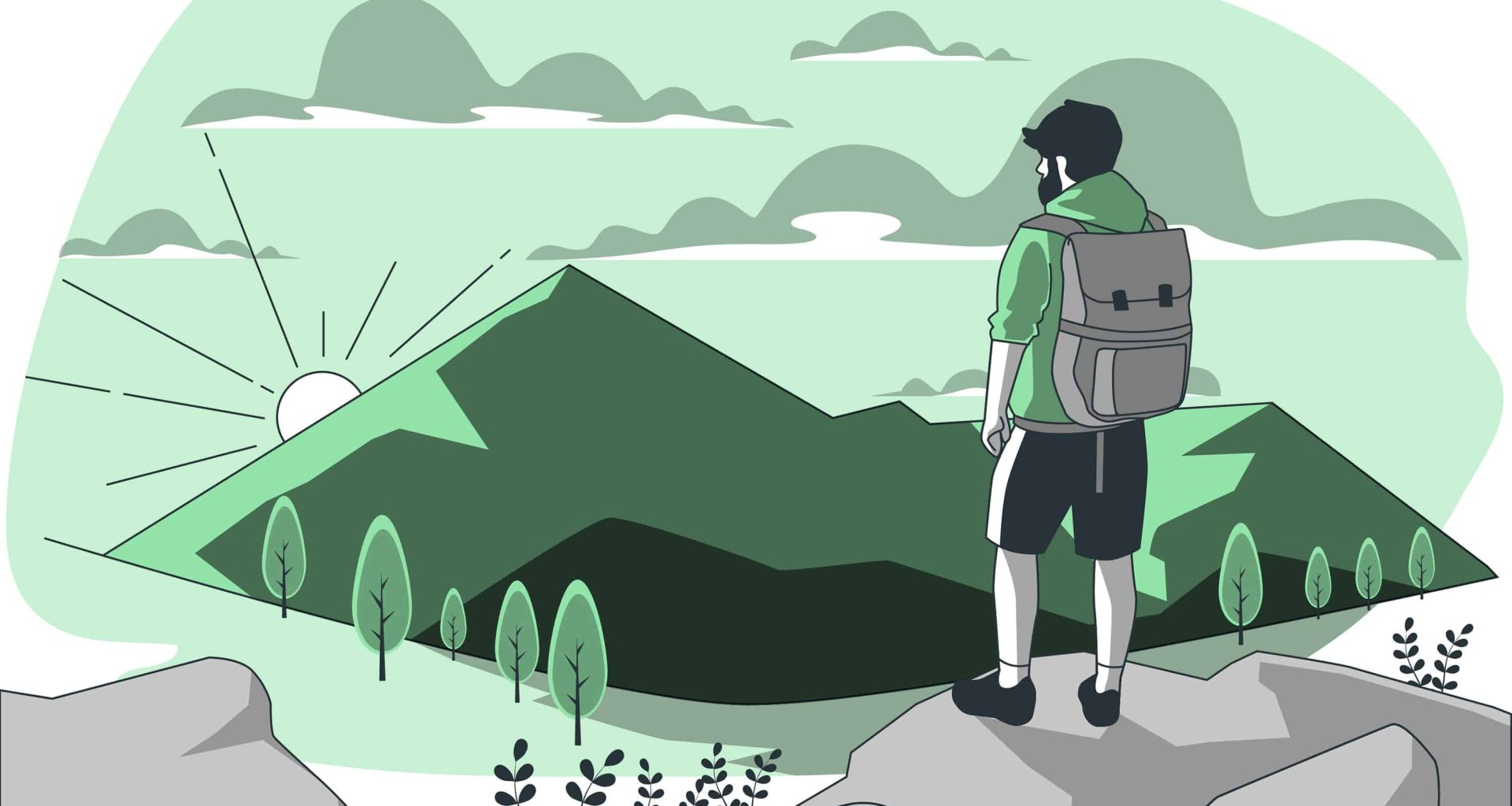 A man with a backpack stands atop a rock, admiring the breathtaking mountain landscape before him.